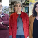 Tres personas de pie, una con suéter rojo, otra con abrigo marrón y una más con suéter gris.