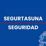 Texto que dice 'SEGURTASUNA SEGURIDAD' en fondo azul.