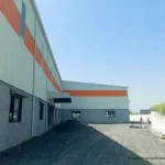 Fábrica de NBI Bearings en India con cielo despejado