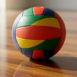 Pelota de voleibol colorida sobre un suelo de madera