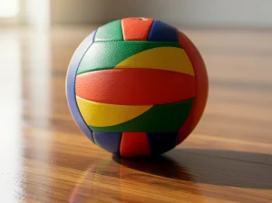Pelota de voleibol colorida sobre un suelo de madera