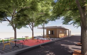 Vista de la zona de descanso y cafetería junto a la piscina