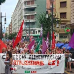 Manifestación con pancarta contra el convenio estatal de comercio